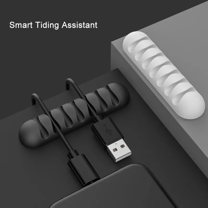 Smooth Design Silicone Cable Holder Black and white with 2 black cables and a smartphone
