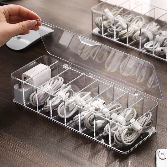 Transparent Cable Organizer Box on wooden desk open lid