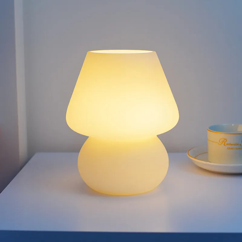 Glass LED Desk Lamp smooth on a bed side table