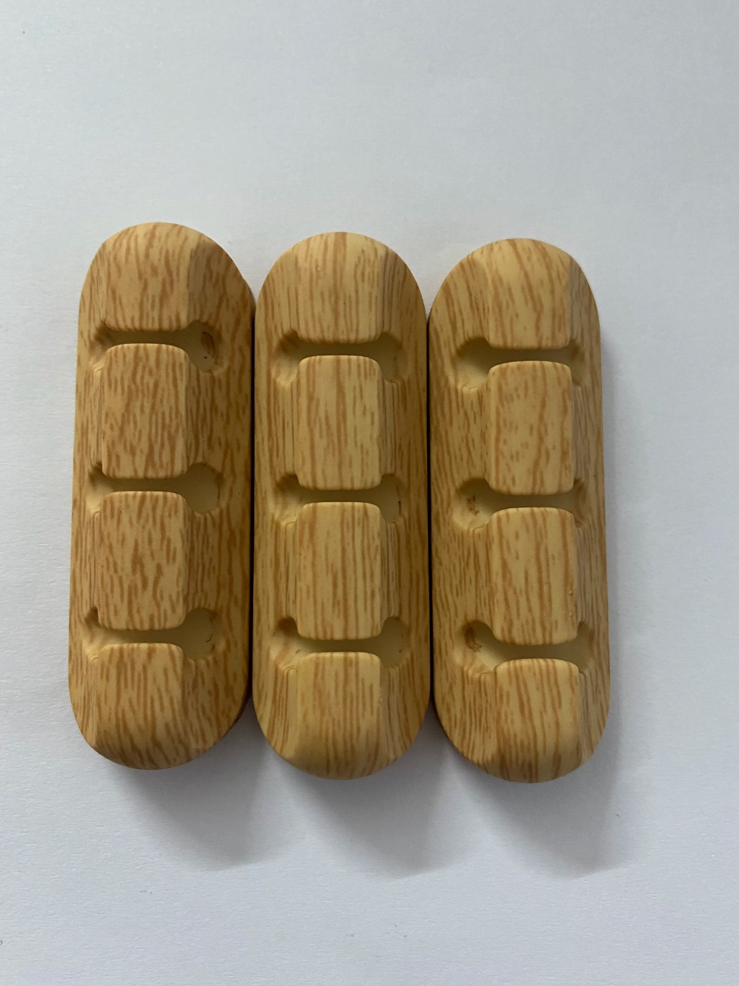 Scalloped Design Silicone Cable Organizer wood 3 clip, top view