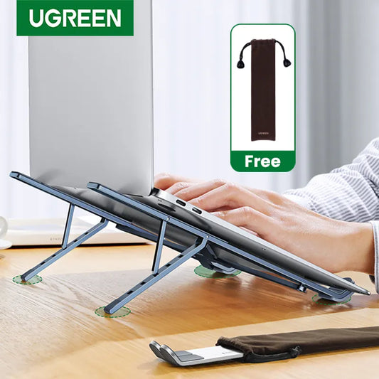 UGREEN Laptop Stand on wooden desk with laptop showing free carry bag and someone typing