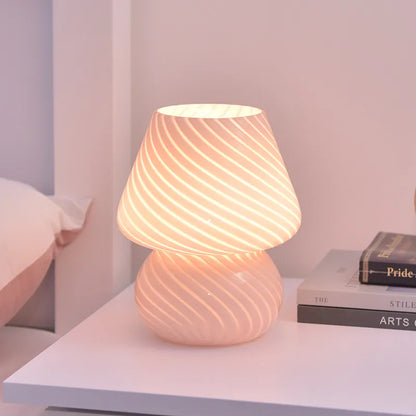 Glass LED Desk Lamp spiral texture on bedside table with books