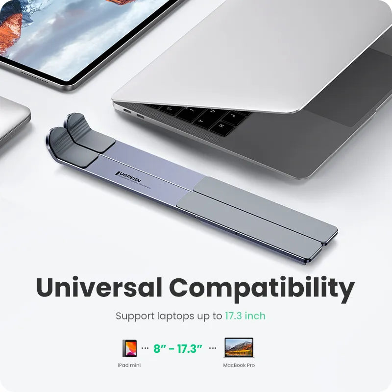 UGREEN Laptop Stand next to a lptop