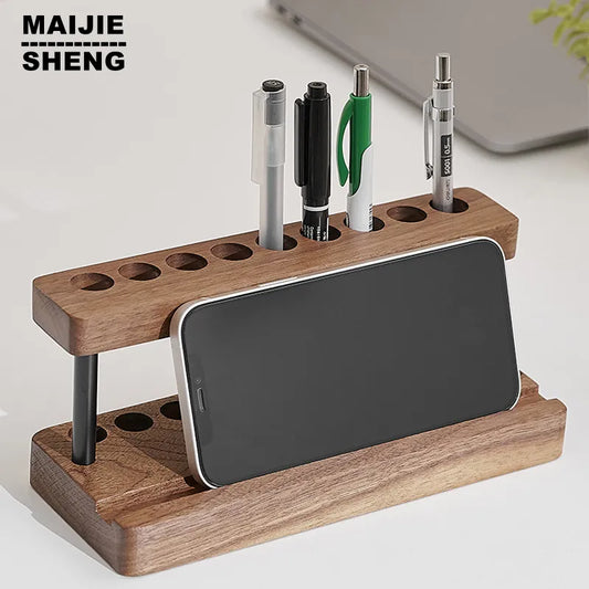 Walnut Pen Holder - Phone Stand on white desk with pens and phone