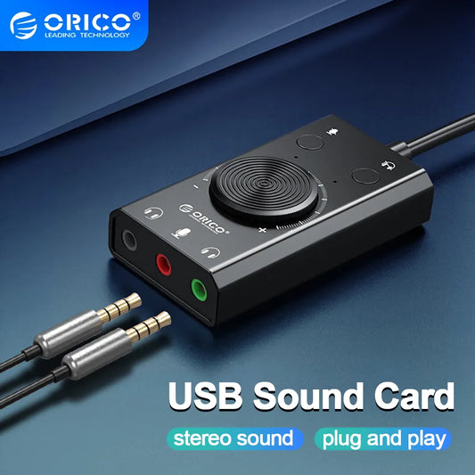 ORICO SC2 External USB Sound Card  with volume control close up on blue table