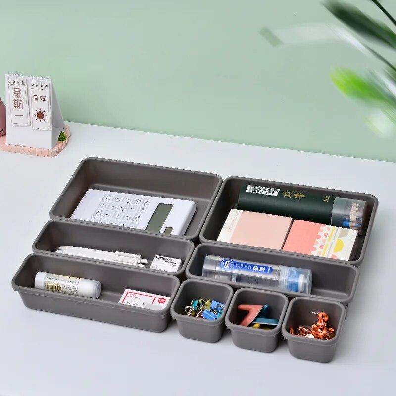 8PCS Combination Drawer Storage Boxes with small items organized inside them, Perspective view