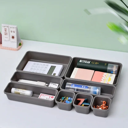 8PCS Combination Drawer Storage Boxes with small items organized inside them, Perspective view