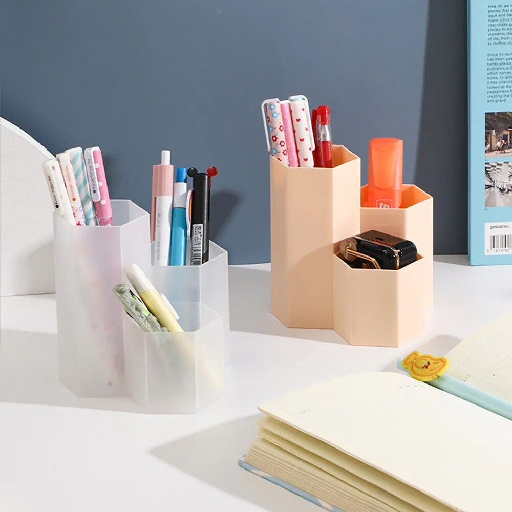 Desk Organizer Storage Box in hexagon shapes with pens inside them